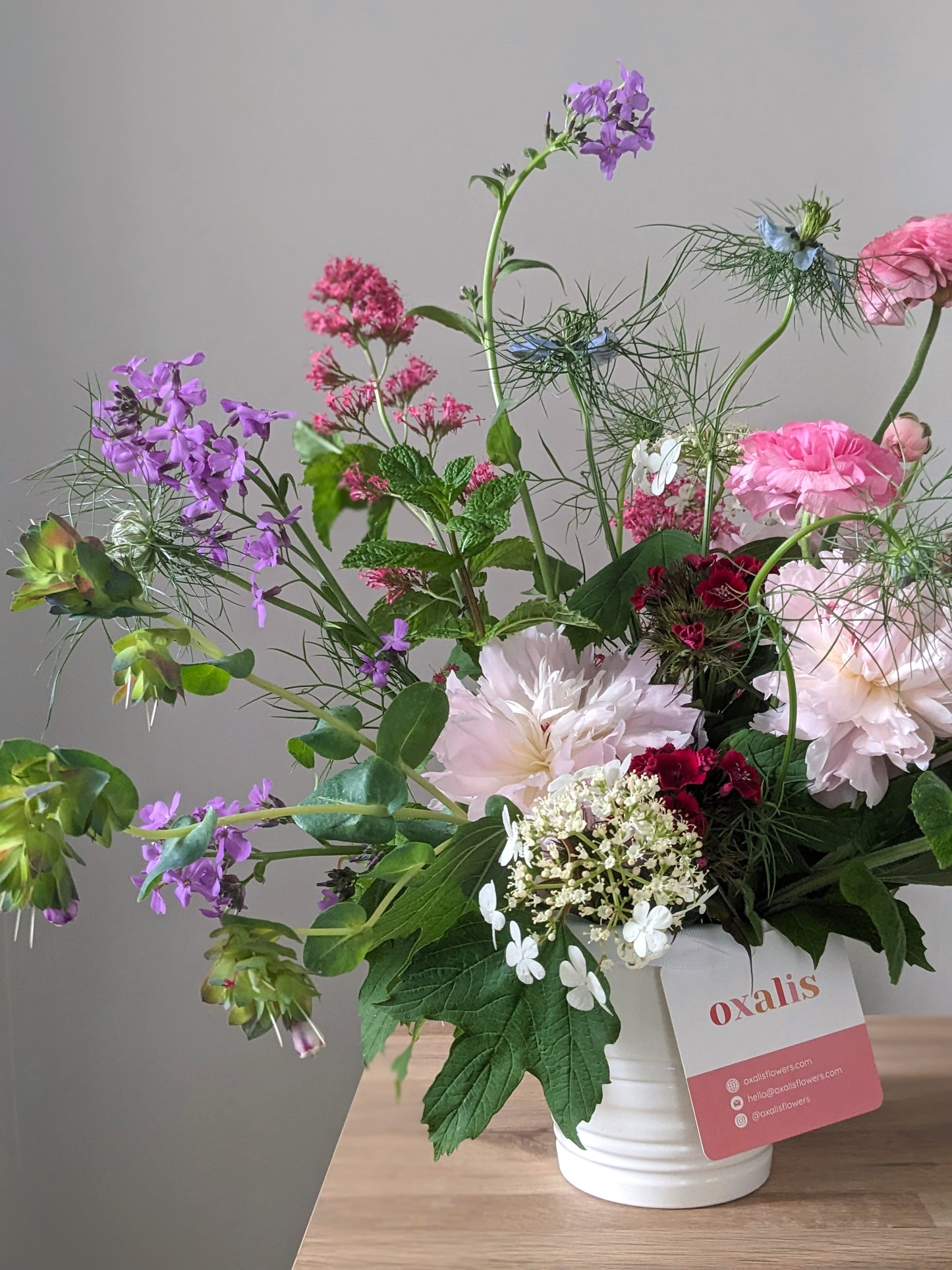 arrangement of spring flowers pink and purple